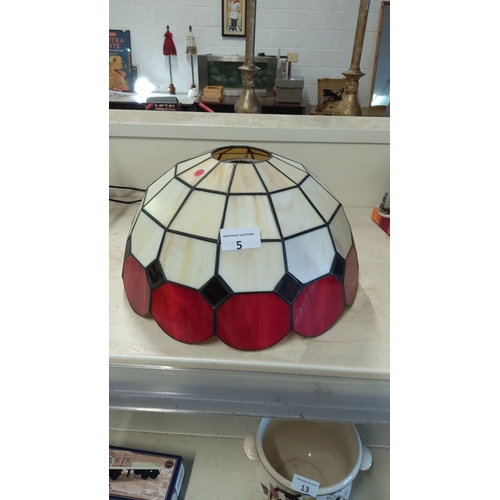 5 - Tiffany-style lamp shade features vibrant red, bone, and black geometric panels. Diameter is approxi... 