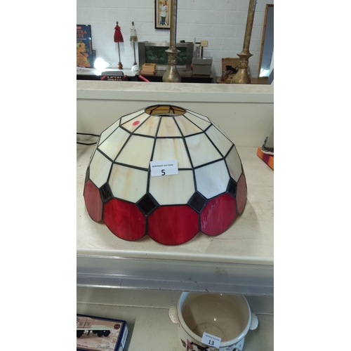 5 - Tiffany-style lamp shade features vibrant red, bone, and black geometric panels. Diameter is approxi... 