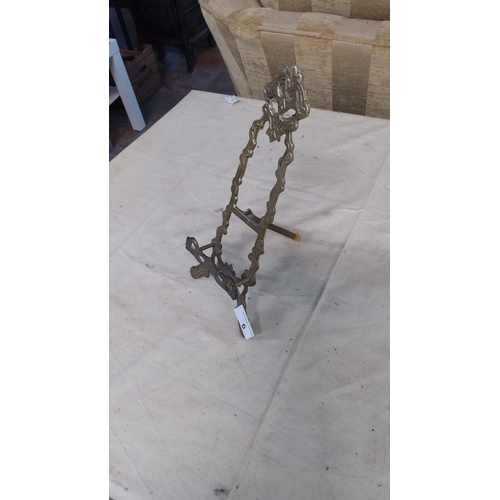 6 - Ornate Victorian-style brass easel stand, from the late 19th to early 20th century. Features elegant... 