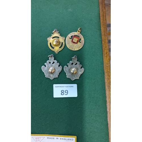 89 - Collection of four vintage sports medals with hallmarks