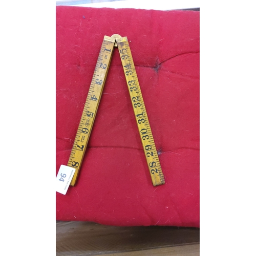 94 - Vintage brass and wood folding ruler, from the early 20th century. Compact design with clear marking... 