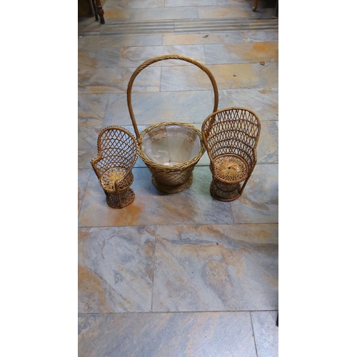 133 - Vintage wicker lot featuring two miniature peacock chairs and a woven basket with handle. Finely cra... 