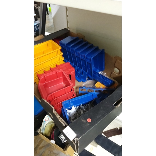 138 - Assorted plastic storage bins come in red, yellow, and blue. Includes additional dividers and access... 