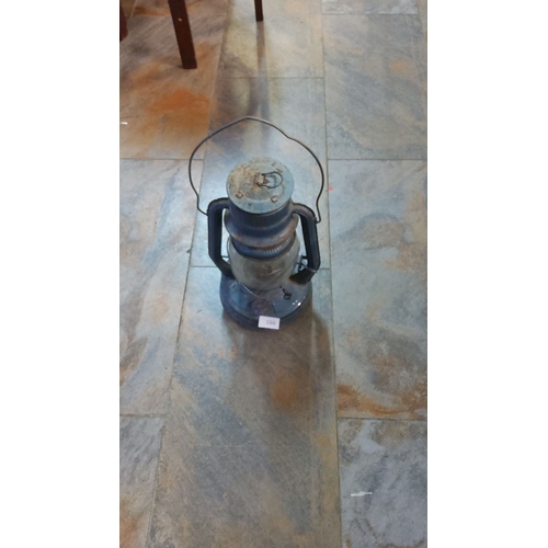 166 - Vintage metal railway lantern with glass enclosure and dual handles.