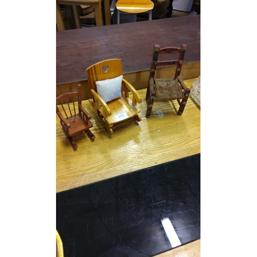 192 - Set of three vintage apprentice piece chairs, including a heart-back wooden rocking chair with cushi... 