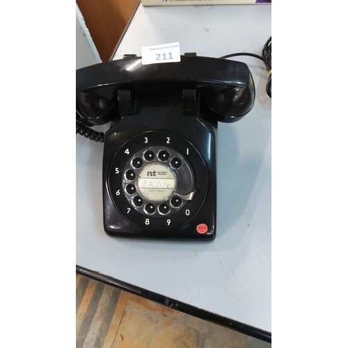 211 - Vintage rotary dial telephone, black Bakelite, from the mid-to-late 20th century. Made in Ireland.