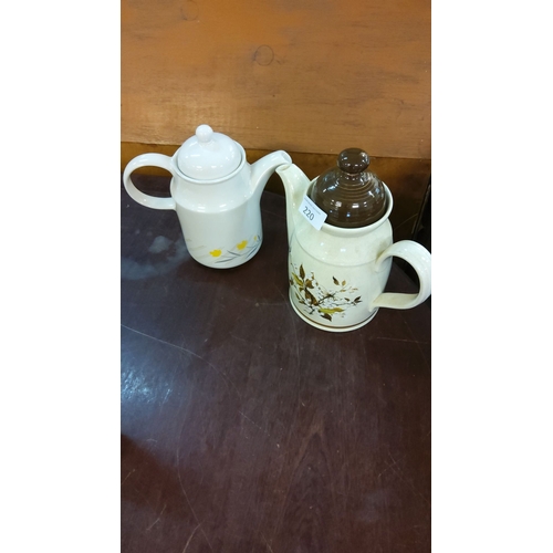 220 - Vintage ceramic teapot duo, featuring floral motifs and contrasting lids.(Royal Doulton 