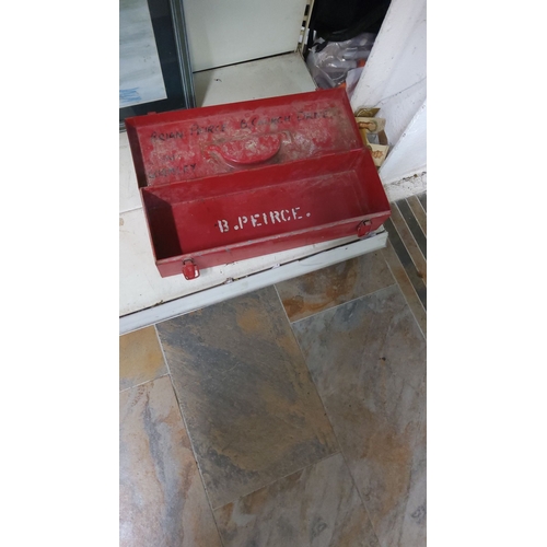 24 - Red metal toolbox with latch closures and sturdy handle. Features a well-worn patina and personalize... 