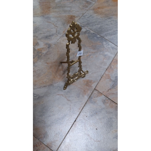 240 - Ornate brass tabletop easel features intricate Rococo-style detailing and has a sturdy fold-out supp... 