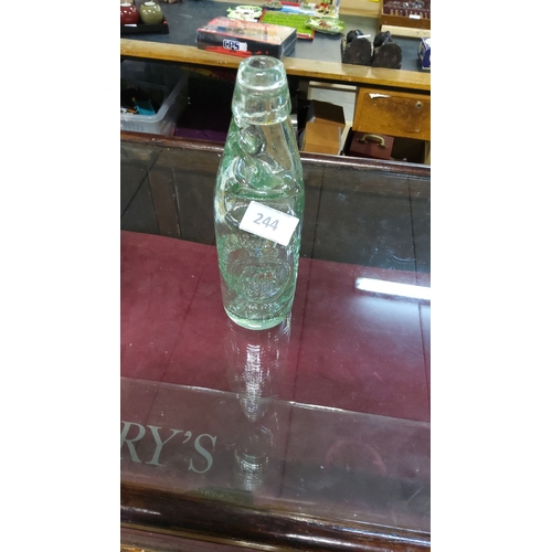 244 - Vintage Codd-neck bottle, embossed glass with marble stopper.(excellent condition)