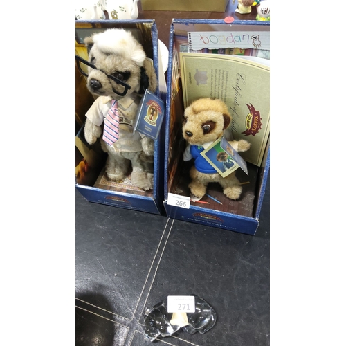 266 - Two boxed Compare the Market meerkat plush toys, complete with tags and certificates.

Glass ornamen... 