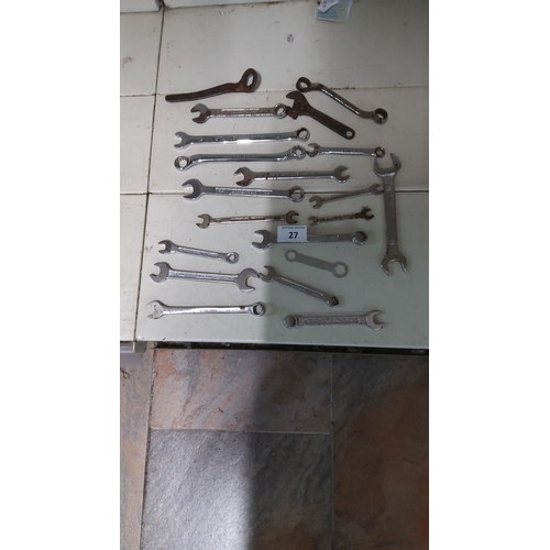 27 - Assorted vintage and modern wrenches, including open-end, box-end, and adjustable types. A mix of ch... 