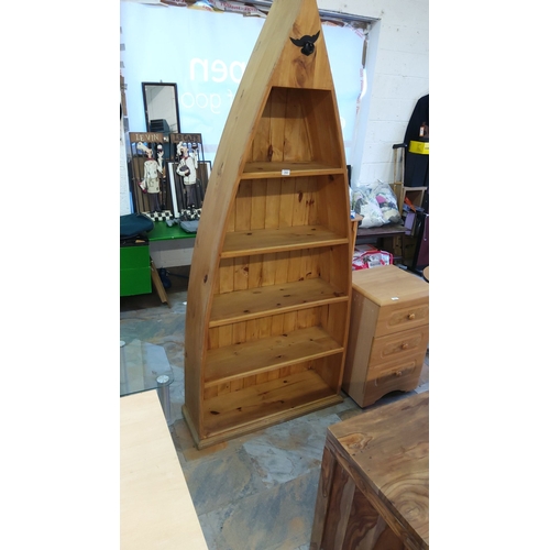 292 - Large Rustic boat-shaped wooden bookcase with four shelves and a charming nautical design. Solid wit... 