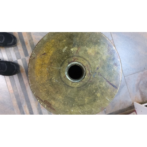 33 - Large brass artillery shell casing from the mid-20th century. Features original patina and stamped m... 