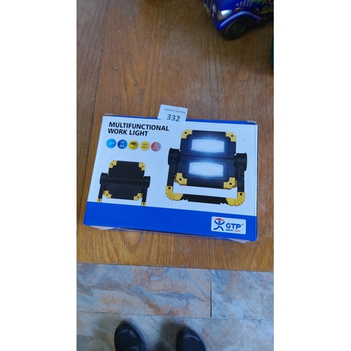 332 - GTP multifunctional LED work light, new in box. Features rechargeable battery, IP44 water resistance... 