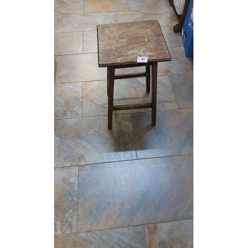 41 - Rustic antique wooden stool with square top and sturdy legs. A charming, timeworn piece with rich pa... 