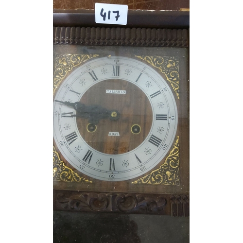 417 - Vintage Talisman 8-day wall clock with decorative glass panel and ornate wood case. It features a Ro... 