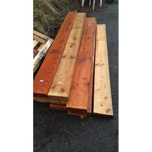 460 - Four lengths of 8ft x 9 inches x 3 inches planks