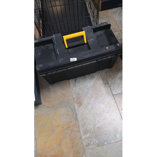 465 - Black plastic toolbox with yellow handle. Features a sturdy design with built-in compartments for or... 