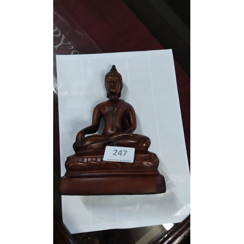 247 - Hand-carved wooden Buddha statue, seated in a meditative pose atop a lotus base. Features fine detai... 