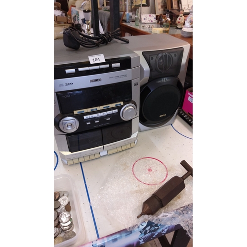 104 - Philips 3-CD stereo system with digital sound control, includes speaker and power cord.