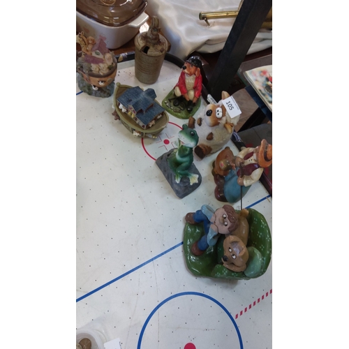 105 - Mixed lot of whimsical figurines, including animal-themed and character-based resin and ceramic piec... 