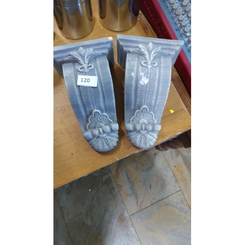 120 - Pair of architectural plastic corbels with ornate floral and scroll detailing, painted wood with a d... 