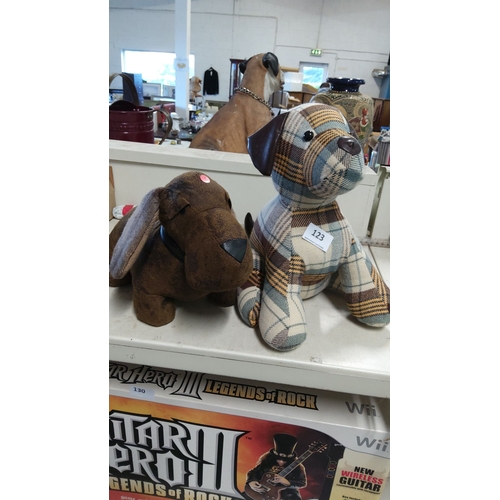 123 - Pair of fabric doorstop dogs, one in classic plaid and the other in textured brown.