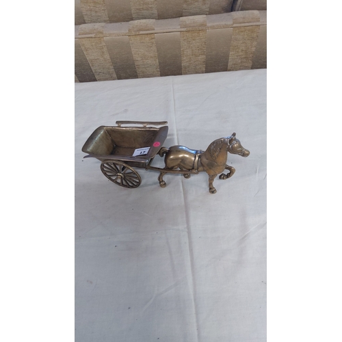 17 - Solid brass horse-drawn cart figurine, finely cast with intricate detailing.