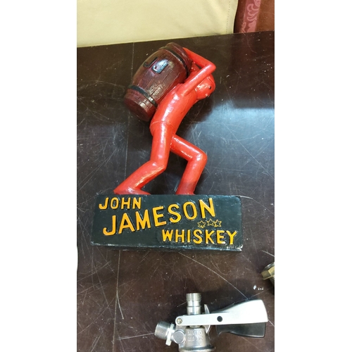 172 - Vintage John Jameson Whiskey advertising figurine, hand-painted cast resin. Features a red figure ca... 