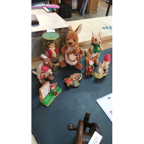 223 - Mixed lot of collectible figurines and plush toys, including vintage kangaroo-themed pieces, gnome d... 