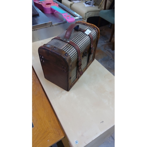 224 - Vintage-style wooden and fabric storage chest with leather straps and metal hardware, featuring a cl... 