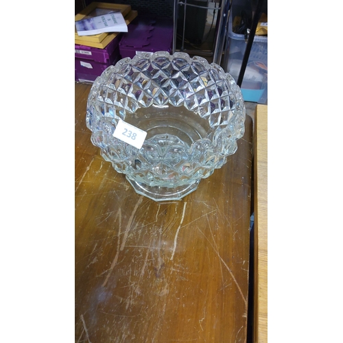 238 - Cut glass fruit bowl with a geometric pattern.