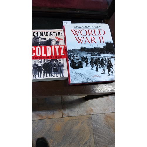 249 - Two WWII history books, including *Colditz: Prisoners of the Castle* by Ben Macintyre and *A Day-by-... 