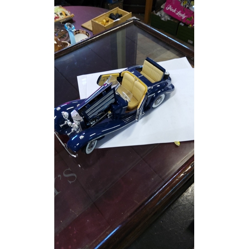 250 - Highly detailed diecast model of a classic Mercedes-Benz 540K convertible in deep blue with cream in... 