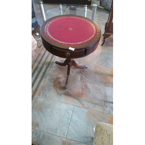 293 - Early 20th-century mahogany drum table with tooled leather top, single drawer, and elegant pedestal ... 