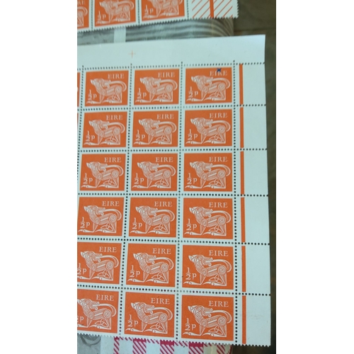 340 - Sheet of vintage Irish ½p stamps, featuring a Celtic zoomorphic design with margins intact.(155+)