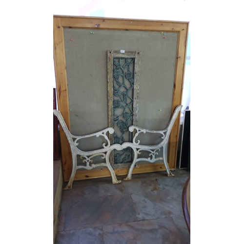 370 - Vintage cast iron bench ends with ornate scrollwork, paired with a decorative plastic bench back