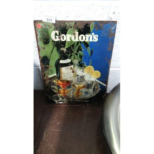 397 - Vintage Gordon's Gin advertising tin sign, featuring a vibrant drinks display.