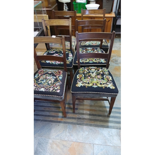 414 - Set of six mahogany dining chairs with hand-stitched needlepoint seats featuring ornate floral and b... 