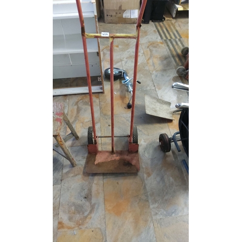 459 - Vintage metal hand truck with red paint and hard wheels