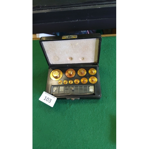 103 - Vintage boxed set of brass apothecary or laboratory balance weights, complete with various denominat... 