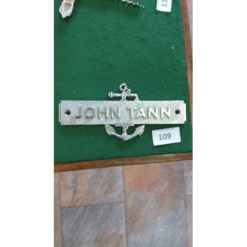 109 - Vintage John Tann nameplate with anchor motif, from a safe or maritime item. Polished metal with 