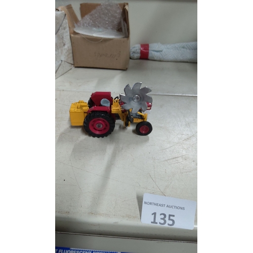 135 - International Harvester 756 toy tractor with mounted hedge cutter attachment. Diecast model with red... 