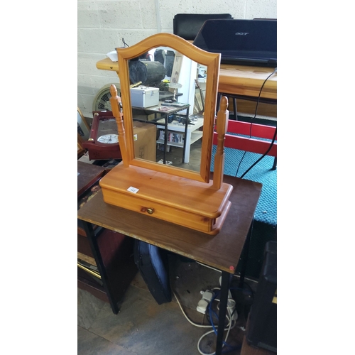 162 - Vintage wooden cheval tabletop mirror with drawer, crafted in pine, featuring an elegant arched fram... 