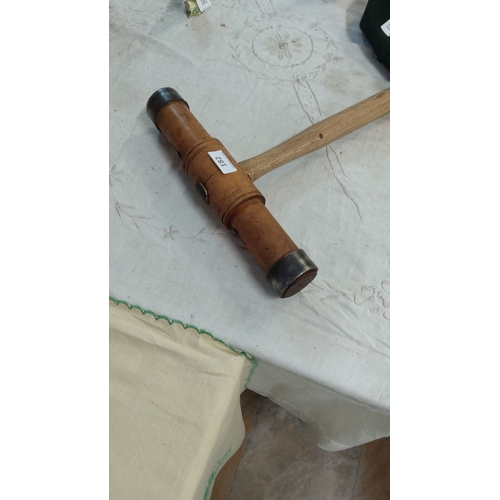 182 - Vintage wooden mallet with metal-banded striking ends.