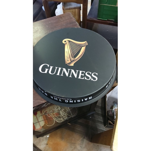 194 - Original serving tray with a Guinness-branded harp logo and bold graphics.