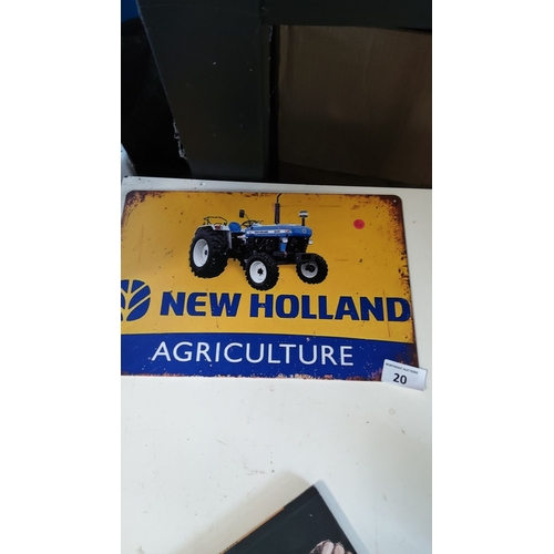 20 - Vintage New Holland Agriculture tin sign, featuring a classic tractor design.