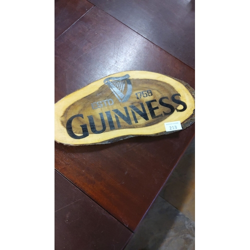 213 - Guinness rustic wooden plaque with bark edge, features the iconic harp logo and 