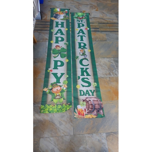 219 - Pair of festive St. Patrick’s Day hanging banners with cheerful leprechaun illustrations, shamrocks,... 